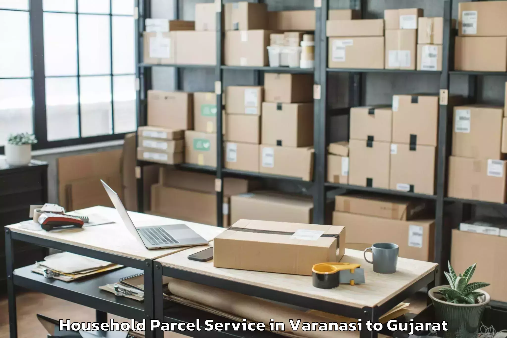 Professional Varanasi to Bhanvad Household Parcel